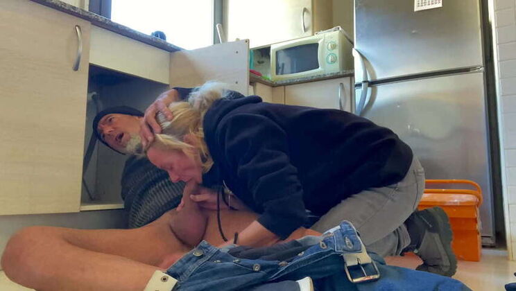 Passionate Blonde Wife Gives X-Rated Blowjob to Plumber, Cum Shot Included