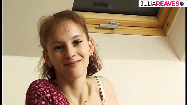 Skinny redhead strips on bed and fingers herself with moaning tits