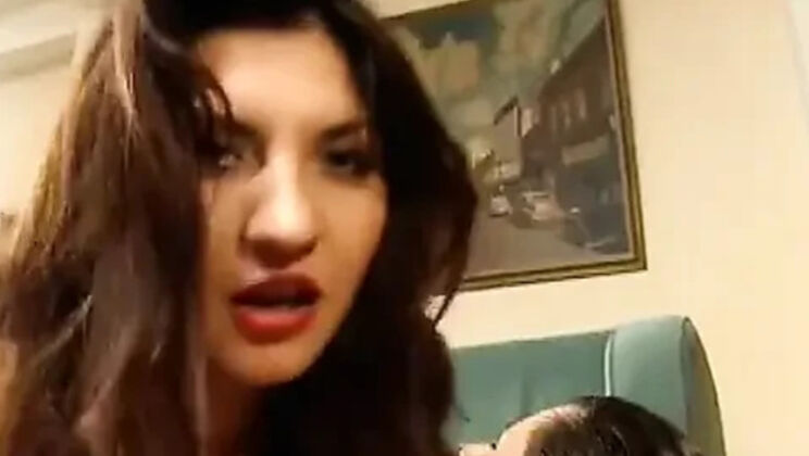 Busty Brunette Gets Double Penetrated on the Couch in Latex