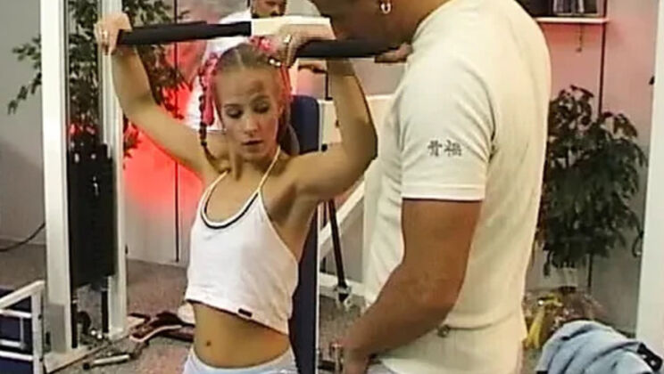 Petite blonde Steffanie Van Eckten rides two cocks in the gym